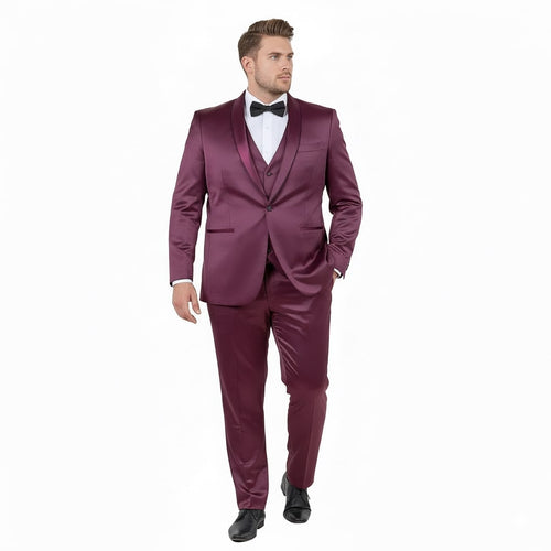 Men's burgundy slim fit tuxedo with a shiny satin finish and shawl lapel. Three-piece suit: jacket, trousers, and matching waistcoat.
