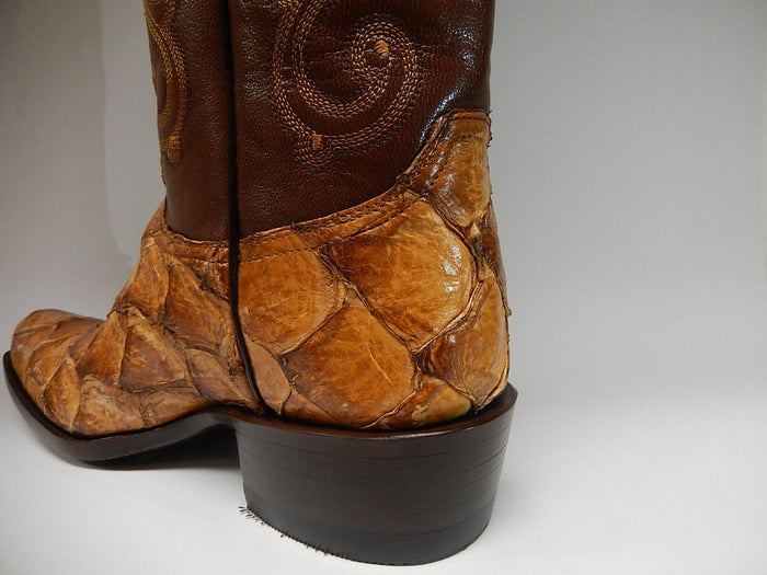 Alberto Nardoni Safari boots: Dark brown leather upper with light brown pirarucu fish skin lower. Pointed toe, block heel. Intricate stitching. Distinct color/material contrast.

