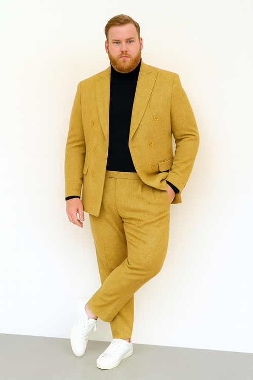 Alberto Nardoni men's gold double-breasted suit. Tailored fit, structured silhouette. Textured herringbone fabric. Jacket: peaked lapels, two rows of buttons. Matching tapered trousers.
