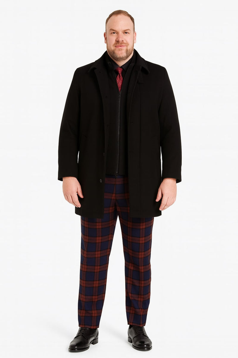 Black wool overcoat with a classic single-breasted design. Tailored fit, straight shape, long sleeves, and buttoned front. Solid black, no patterns.
