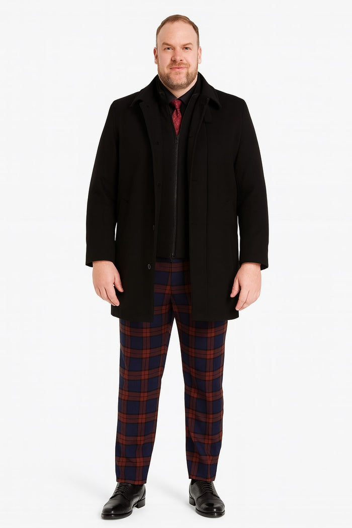 Black wool overcoat with a classic single-breasted design. Tailored fit, straight shape, long sleeves, and buttoned front. Solid black, no patterns.
