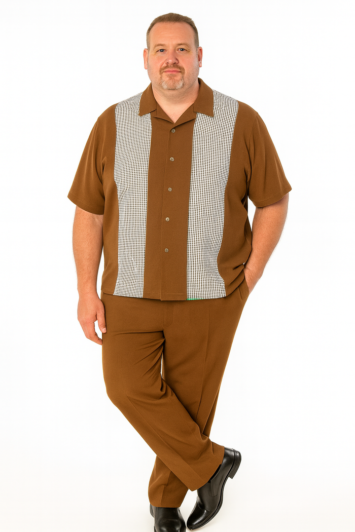 Men's cognac tan two-piece outfit: short-sleeve button-up shirt with checkered panels, notched collar, relaxed fit, and matching straight-leg pants. Lightweight, smooth fabric. Warm color palette.
