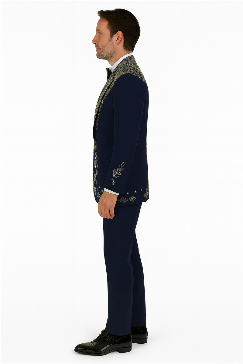 Navy tuxedo: gold embroidered lapels & cuffs. Structured fit, navy trousers, black dress shoes. Classic & elegant formal wear for men.
