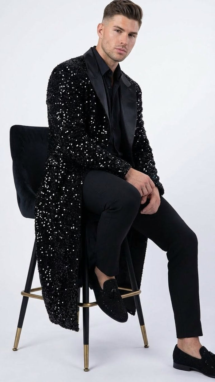 Men's black sequin long coat with satin shawl lapel. Fitted silhouette, long sleeves, densely sequined for light reflection.
