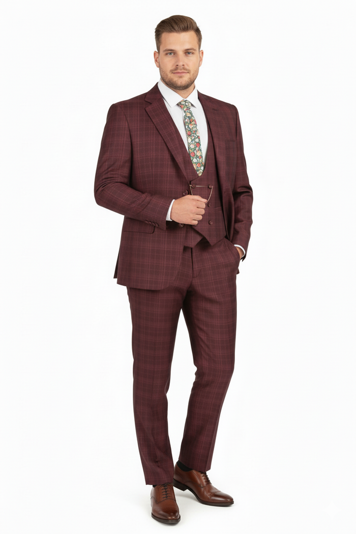Burgundy checkered three-piece suit. Classic fit blazer with notch lapel, matching vest, and tailored pants in a windowpane pattern. Smooth fabric, deep burgundy color. Blazer features two front pockets and a single button closure, pants with straight legs.
