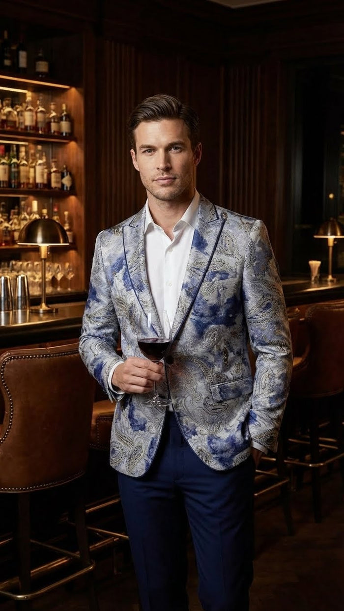 Men's navy & gray paisley blazer. Structured fit, peak lapels, intricate pattern. Features front pockets. Modern silhouette.
