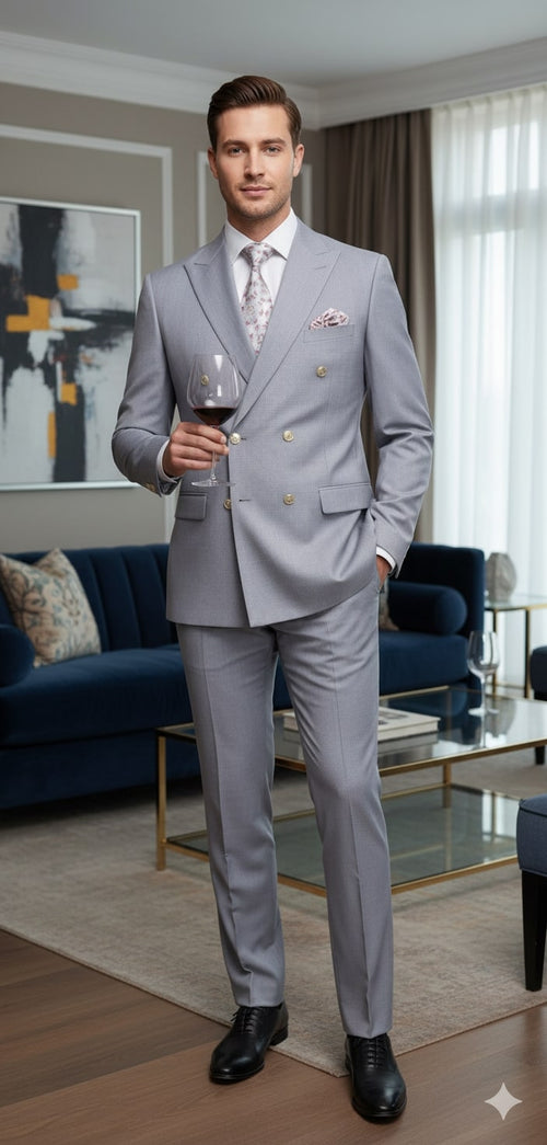 Men's silver-grey 3-piece suit with a tailored fit. Double-breasted jacket, structured lapels, gold buttons. Smooth, subtly shiny fabric. Slim-fit trousers complete the look.