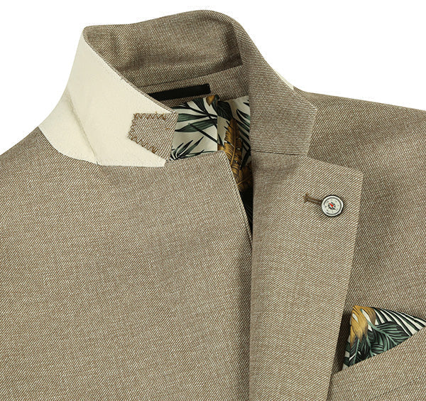 Khaki slim-fit blazer with a structured, contrasting collar and textured weave. Features a button, patterned inner lining (foliage), and a matching pocket square. Half canvas construction.
