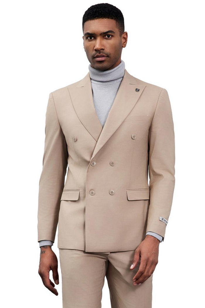 Tan Stacy Adams double-breasted suit. Classic structured shape with wide lapels. Features side and chest pockets. Smooth, tailored fabric. Matching trousers for a formal, cohesive look.

