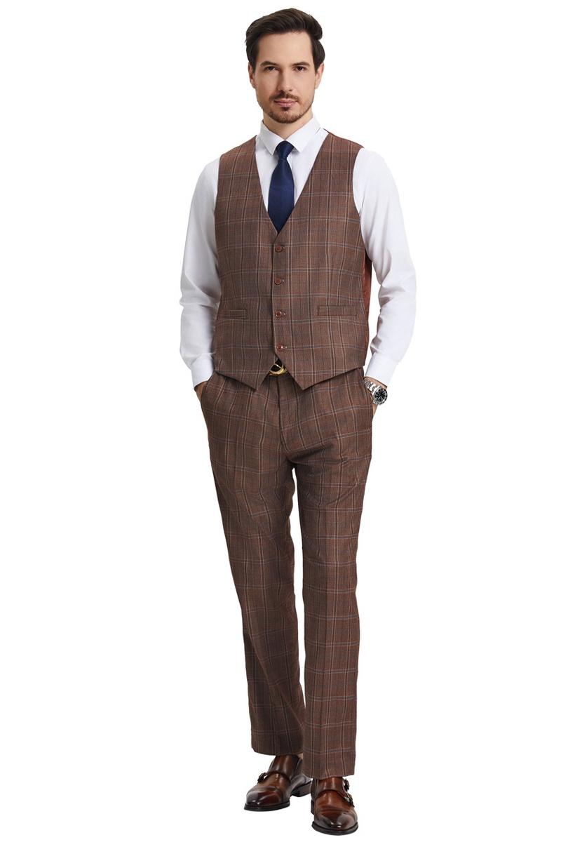 Stacy Adams men's modern fit suit in light brown with windowpane plaid. Includes a fitted vest and straight-leg trousers. Smooth fabric with a light brown base and darker plaid pattern. Tailored look.

