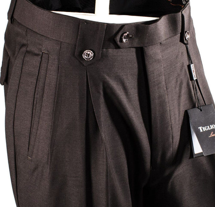Tiglio Luxe brown wide-leg wool dress pants. Smooth texture, double pleats, flat front. Two-button waistband, belt loops. Pure wool.

