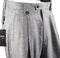 Tiglio Luxe light gray wool wide-leg dress pants with birdseye texture, high waist, and two front pleats. Secured with two black buttons.
