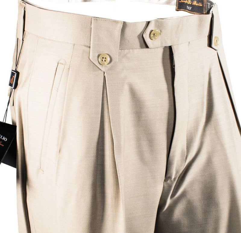 Tiglio Luxe tan wool wide-leg pants. Features: straight-leg, pleats, smooth wool, two front buttons, and side pocket. Tailored design.
