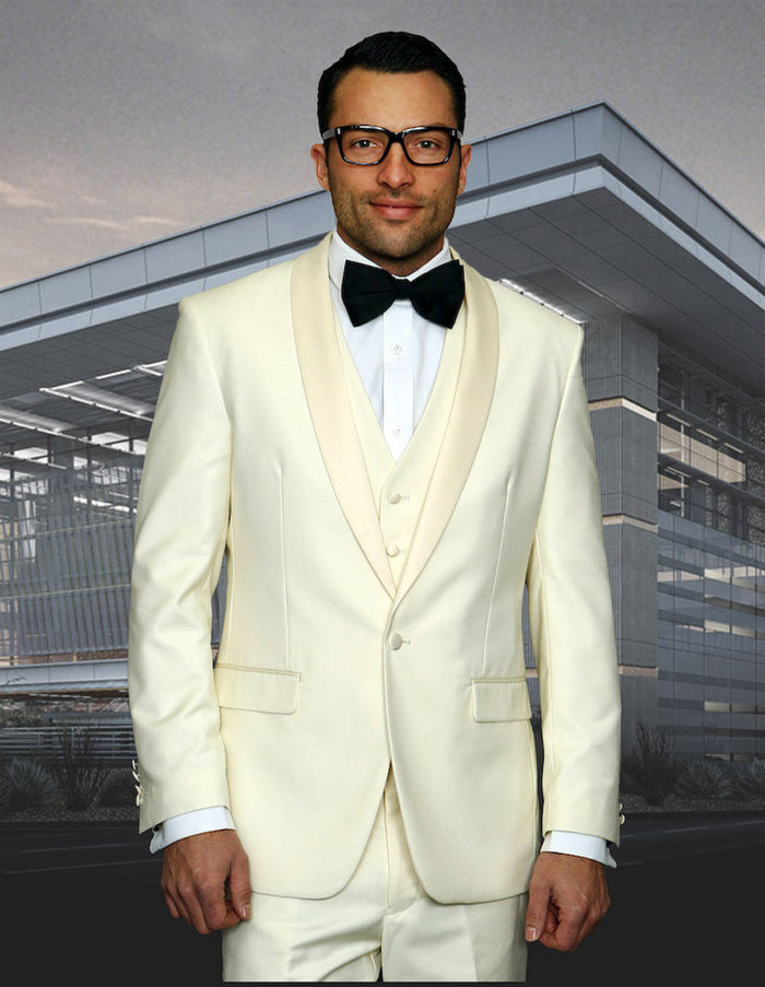 Ivory wool tuxedo with a modern fit. Features a one-button closure, shawl collar, three-piece vest, and straight-leg trousers. Smooth fabric, perfect for prom.

