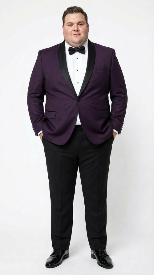 Men's eggplant purple tuxedo blazer: single-breasted, satin lapels, two front pockets. Shown on model with black pants and shoes.
