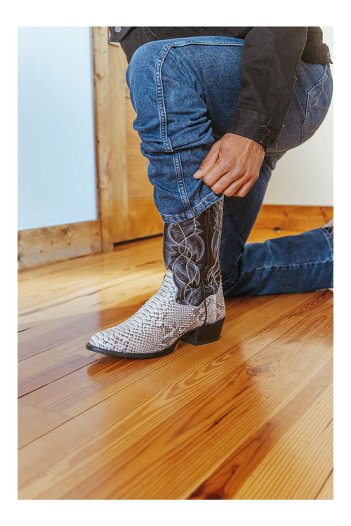 Dan Post Manning Python boots: men's snakeskin, round toe. Natural-colored python skin upper with patterned shaft. Stacked low heel.
