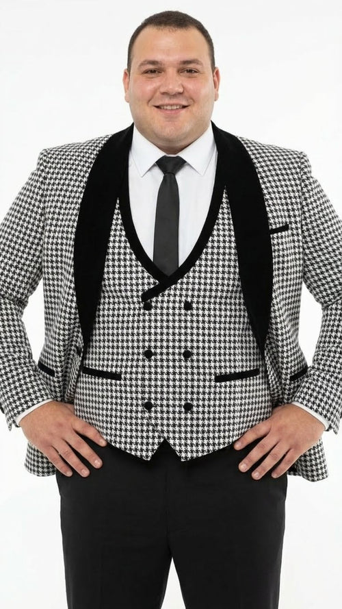 Men's houndstooth tuxedo set: black & white pattern, velvet shawl lapel, double-breasted jacket. Includes black trousers. Structured silhouette for a formal look.
