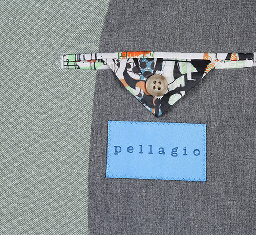 Pellagio light sage gray slim fit blazer. Half canvas, tailored silhouette. Decorative pocket flap with colorful pattern, button detail. "pellagio" brand label in blue.
