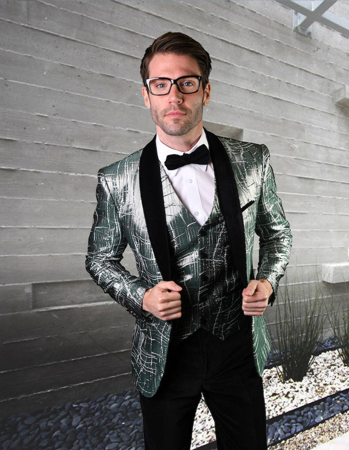 Men's one-button tuxedo: Shiny green organic print jacket with cracked pattern, black velvet shawl collar. Includes green vest and black trousers.
