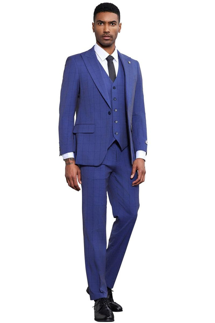 Men's Stacy Adams modern fit suit. French blue tonal windowpane plaid. Includes jacket (notched lapel, 3-button), vest, and pants. Fitted silhouette. Paired with white shirt and black tie.