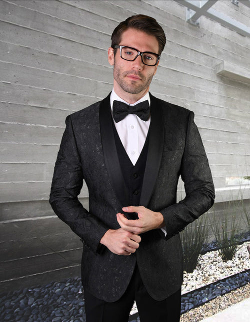 Black men's tuxedo vest with geometric leaf pattern, fitted design, satin lapels, and a three-button front. Features a subtle sheen.

