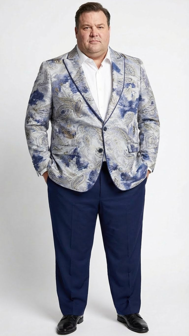 Alberto Nardoni men's blazer. Navy & gray paisley print with gold accents. Structured, notched lapel, two pockets. Single-breasted, two-button closure. Paired with navy trousers.
