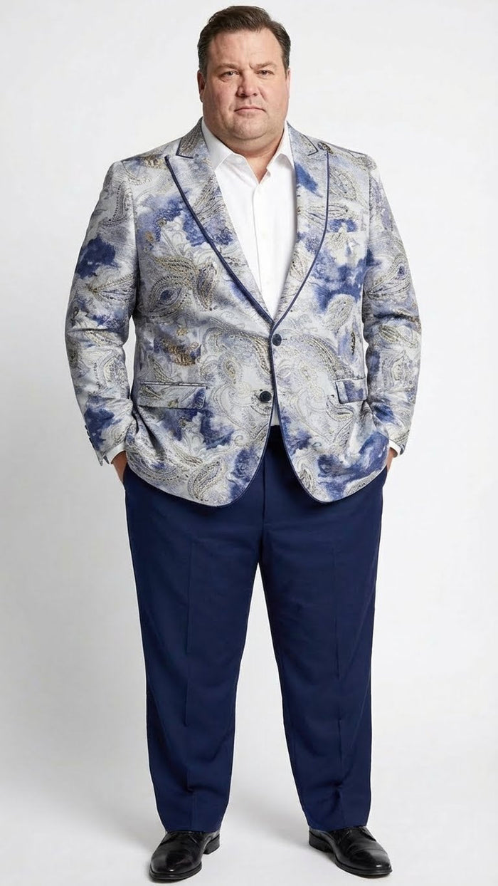 Alberto Nardoni men's blazer. Navy & gray paisley print with gold accents. Structured, notched lapel, two pockets. Single-breasted, two-button closure. Paired with navy trousers.
