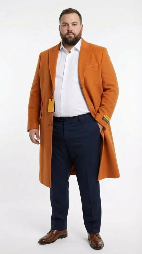 Men's orange rust wool blend overcoat. Tailored shape, single-breasted, wide lapels, long sleeves. Vibrant color contrasts well with darker trousers.
