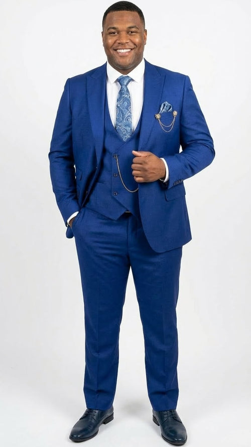 Men's royal blue three-piece suit set: tailored trousers, fitted jacket, and matching vest. Features smooth, textured fabric, a silver chain, and structured shoulders. Cohesive, uniform design.
