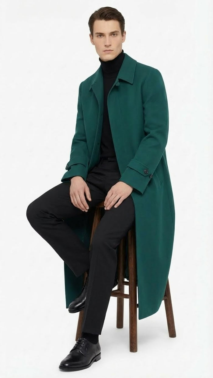 Alberto Nardoni men's green overcoat. Full-length, straight cut with notch collar and button cuffs. Solid, thick fabric in vibrant green. Reaches the knees.
