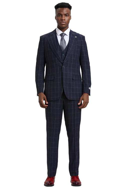 The men's Stacy Adams vest features a classic bold windowpane pattern in navy blue, made from a textured fabric. It has a fitted design with a notched lapel and two front pockets.