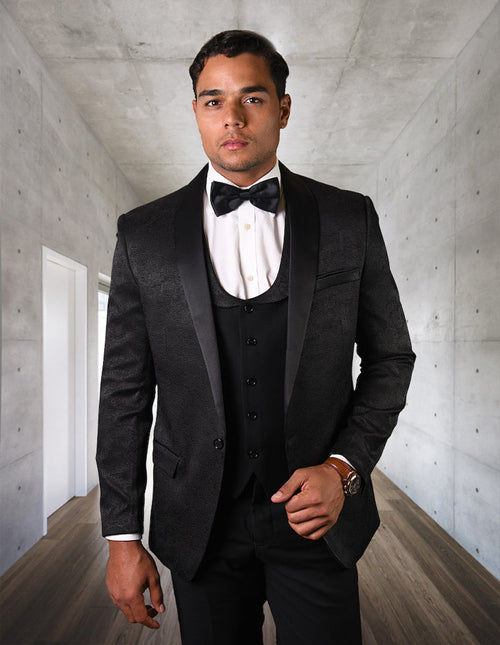 Men's black paisley tuxedo. One-button closure, shawl lapel, and vest. Matching trousers complete the formal, fitted look. Smooth, shiny fabric. Perfect for prom!
