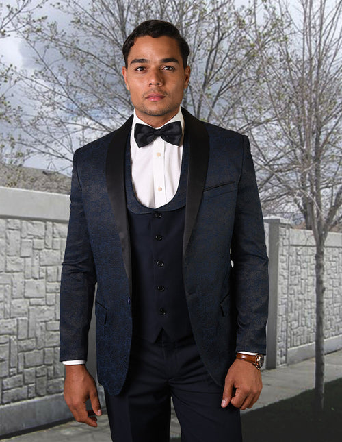 Navy paisley tuxedo with a shawl lapel and one button closure. Fitted design includes a matching vest. Perfect for prom!
