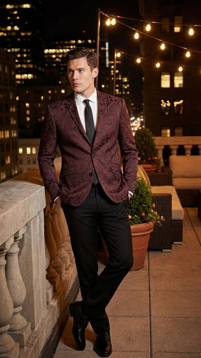 Burgundy velvet paisley blazer for men. Floral pattern, tailored fit, notched lapels, and single-button closure. Luxurious and stylish.
