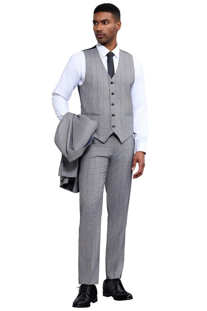 Stacy Adams light grey modern fit suit. Three-piece set: vested jacket, trousers, and suit jacket. Tonal windowpane plaid pattern. Straight-cut trousers. Includes vest with five buttons. Tailored, cohesive look.
