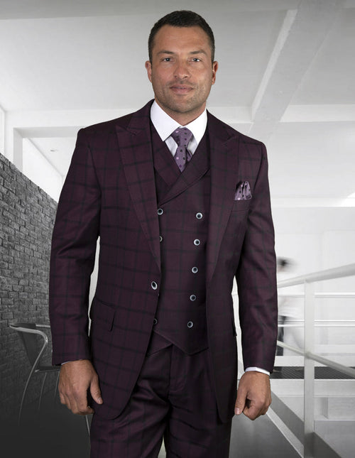 Men's burgundy plaid suit. Classic fit, peak lapel jacket (one button), double-breasted vest. Tailored pants complete the look. Woven fabric with burgundy & dark lines.
