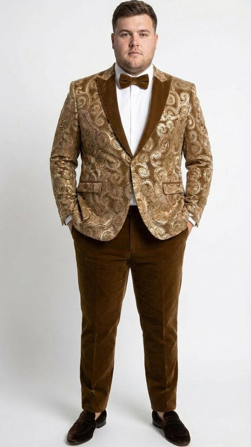 Goldish-brown men's tuxedo jacket. Fitted velvet with notched collar, front pockets, and swirling embroidery. Paired with matching brown trousers for a cohesive, rich look.
