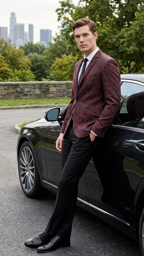 Men's burgundy velvet blazer. Paisley floral pattern. Tailored fit, traditional lapels, single-button closure. Sport coat for a stylish look.

