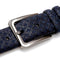 Mezlan belt: Deep blue textured strap with subtle pattern and adjustable holes. Features a square, silver-toned metal buckle for secure fastening.
