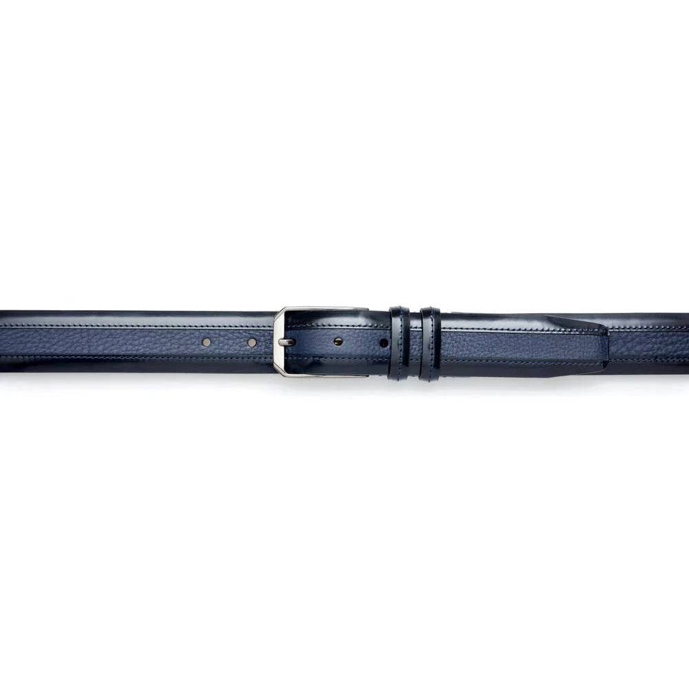 Mezlan blue deerskin belt. Smooth, elongated shape with a shiny finish. Silver buckle and multiple adjustment holes.

