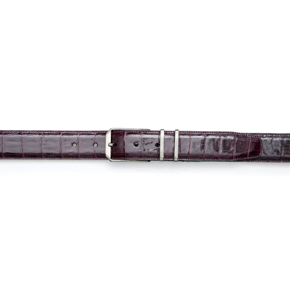 Burgundy Mezlan crocodile belt: smooth, shiny surface with raised scales. Features a polished metal buckle and adjustable belt holes. Made with genuine crocodile leather.
