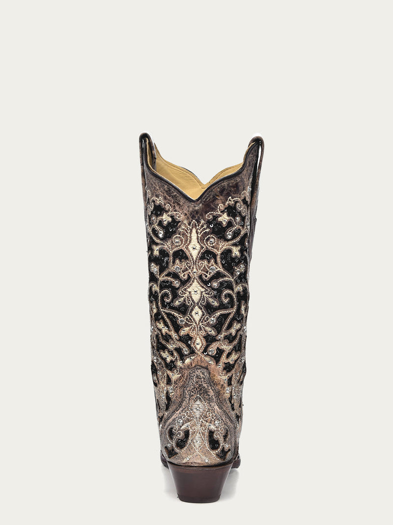Corral women's black glitter cowboy boots with intricate swirling black and metallic gold inlay design. Features pointed snip toe, elevated heel, and glitter accents. Detailed inlay extends to boot opening.
