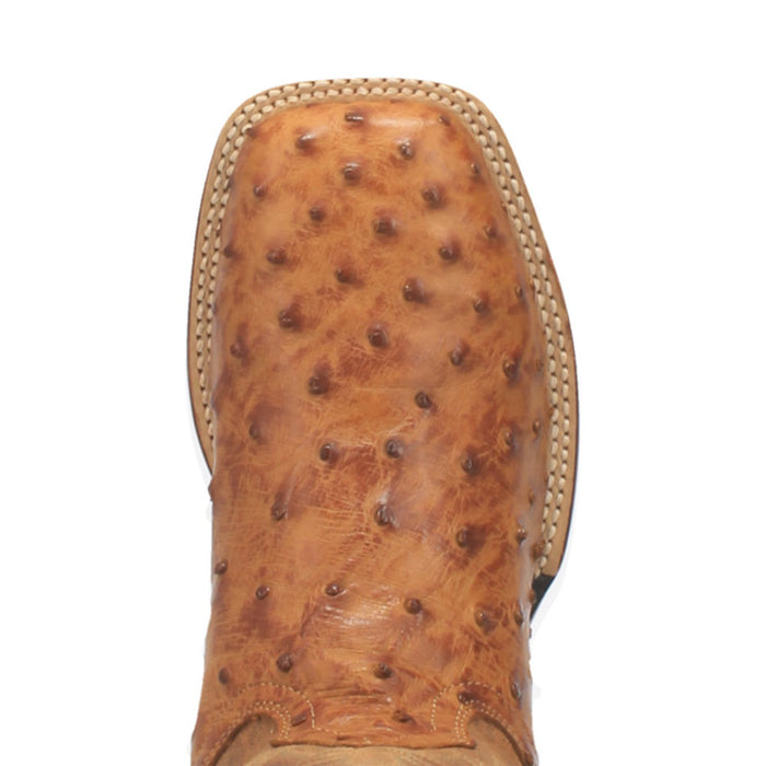 Dan Post Alamosa tan ostrich cowboy boot. Broad square toe, textured surface. Tan leather with rounded protrusions. Contrasting stitching on the upper edge.
