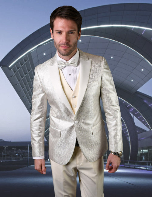 Ivory men's tuxedo with shiny pattern. Peak lapel blazer, matching vest & tailored trousers. Reflective fabric, bow tie, and button closure for a formal, cohesive look.
