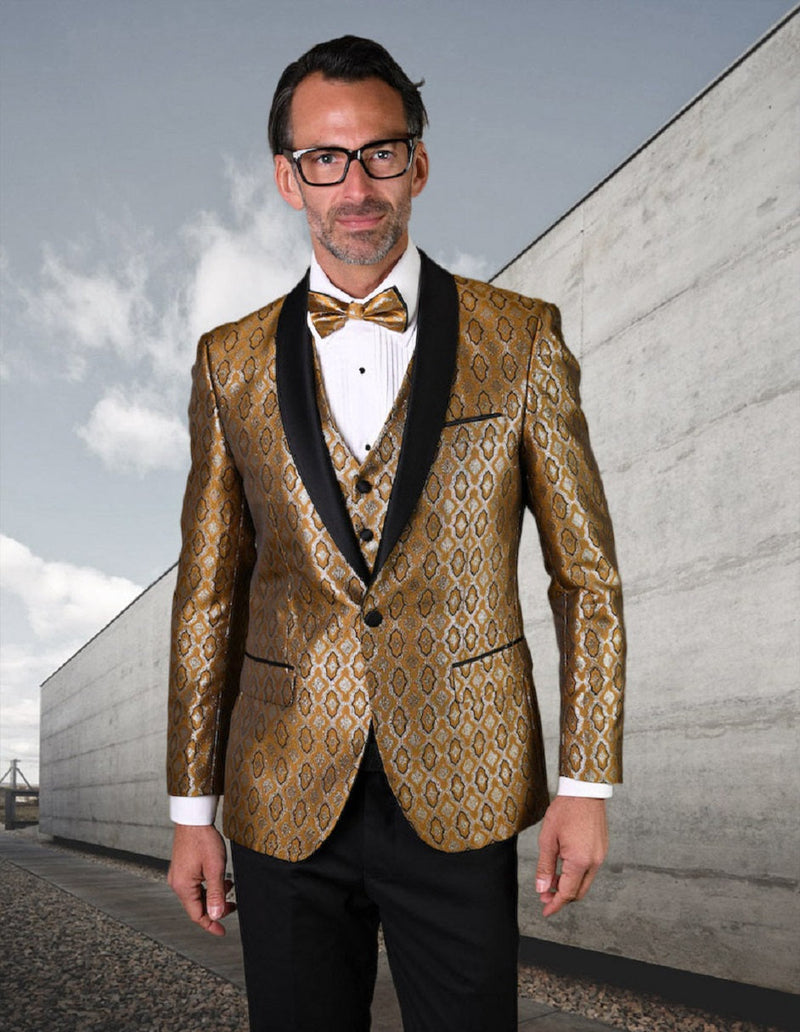 Gold diamond-print tuxedo. Fitted jacket with black lapel, matching vest, and classic-cut black trousers. Shiny gold fabric.
