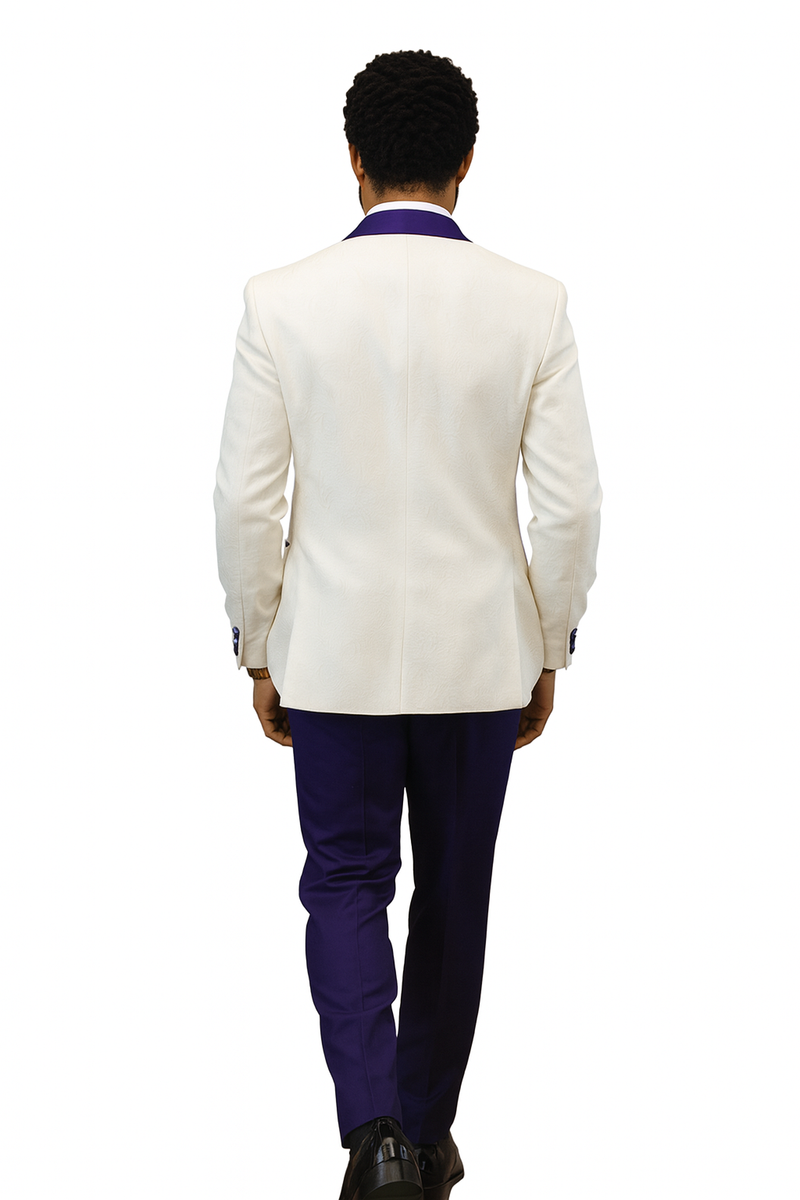 White tuxedo jacket with paisley pattern, purple shawl lapel, and purple wool pants. Tailored and structured for formal events. Back view reveals smooth jacket lines and well-fitted trousers.
