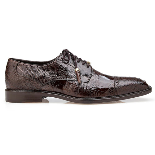 Brown ostrich leather Belvedere Batta dress shoe. Pointed toe, lace-up, and textured finish. Glossy with subtle sheen. Decorative perforations and layered heel. Flat, sturdy sole.
