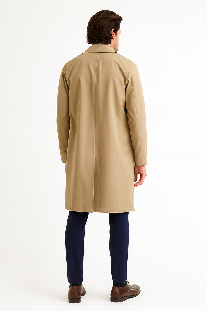 Men's beige trench coat. Classic long design with button front, water-resistant material. Khaki color, structured straight cut, traditional collar, long sleeves, flat back.
