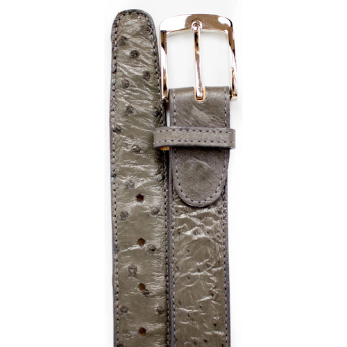 Blue ostrich quill leather men's dress belt. Classic shape with adjustable holes. Silver-tone metal buckle. Uniform stitching complements the finish.
