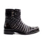 Black Belvedere Libero men's dress boot. Caiman quilted upper with smooth toe/heel. Ankle height, decorative buckle strap. Glossy finish, raised sole, square toe.
